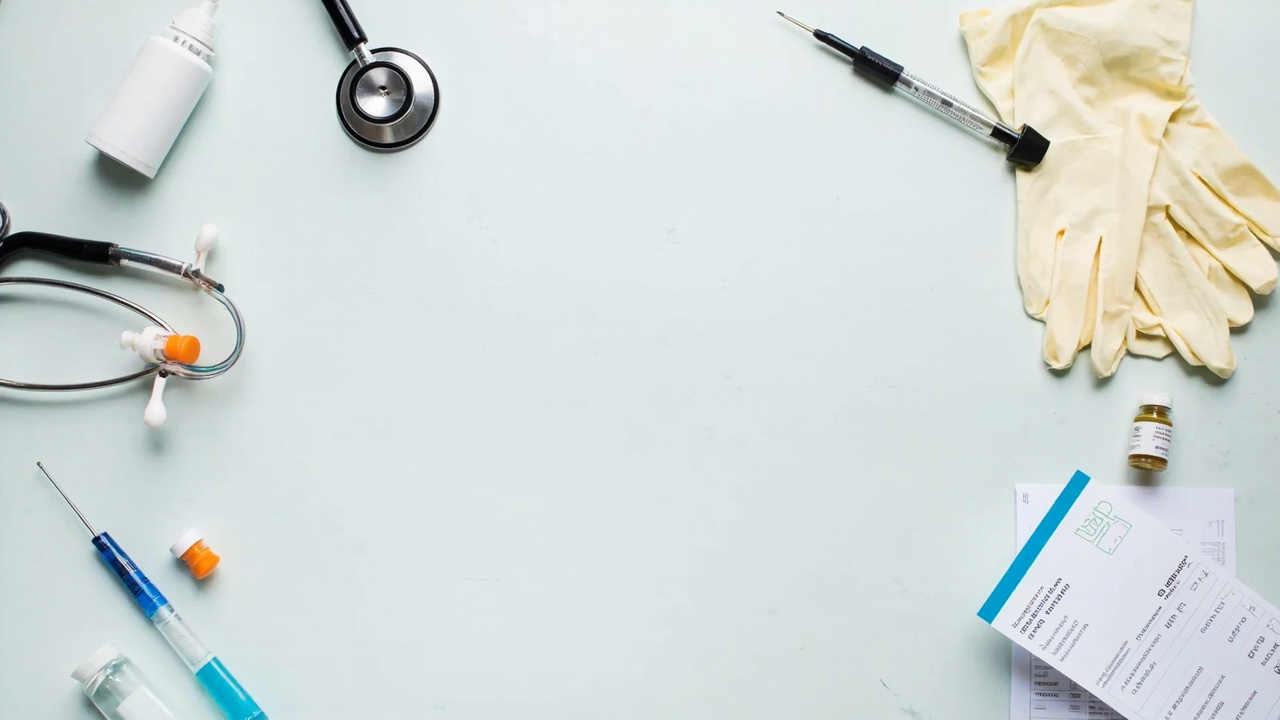 Veterinary tools and supplies laid out with a printed invoice